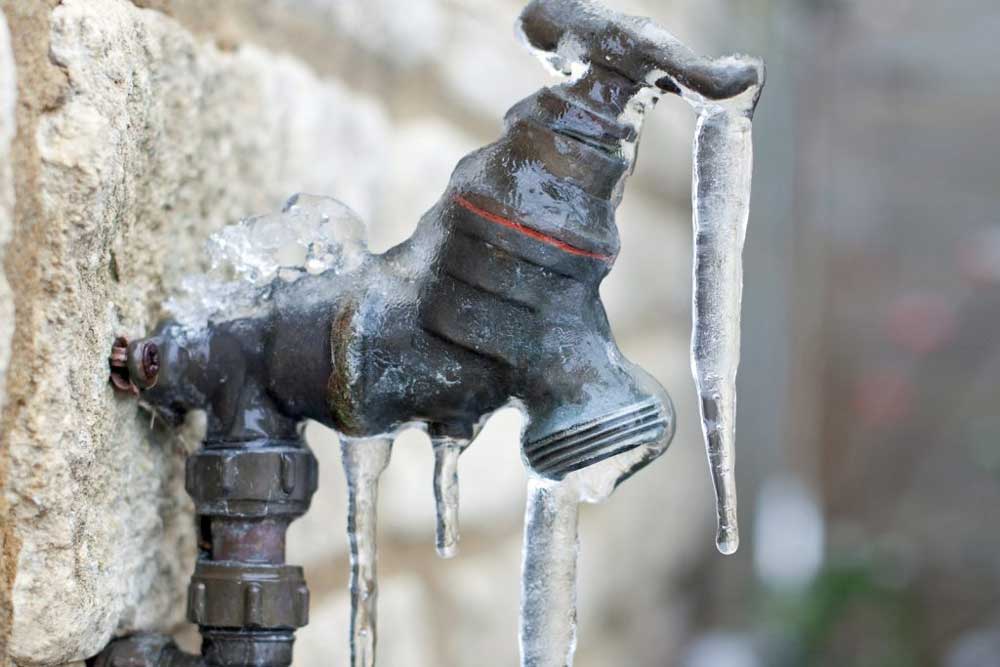 How to Winterize Outdoor Spigots (With Easy Alternatives!)